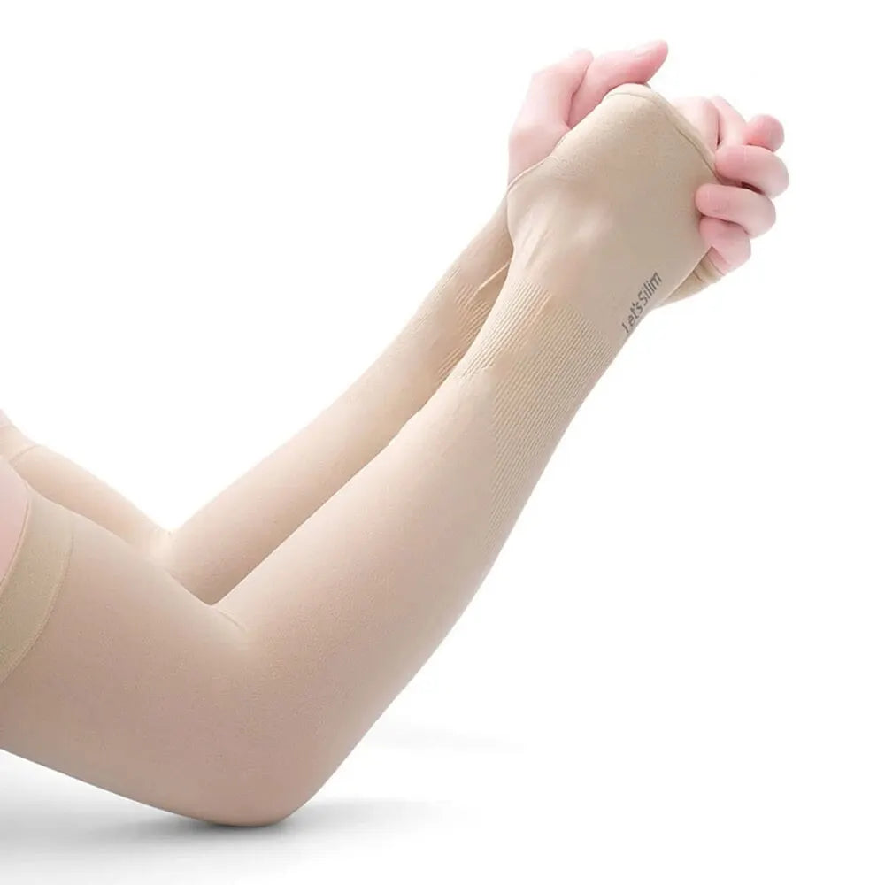 A person's arm wearing a light beige protective arm sleeve for sun and UV protection.