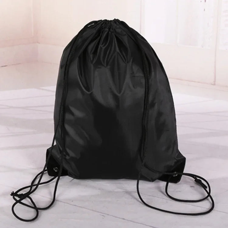 Black multipurpose drawstring storage bag shown from the back