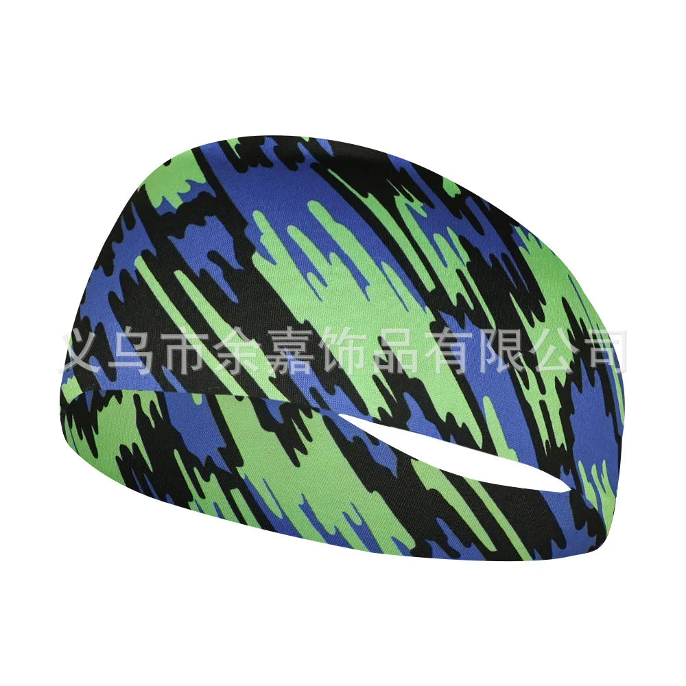 A close-up of a black and green camouflage sports headband worn on a person's forehead.