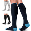 A pair of navy blue compression socks with light blue accents shown on a foot and leg.