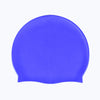 A bright blue waterproof silicone swimming cap viewed from the side.