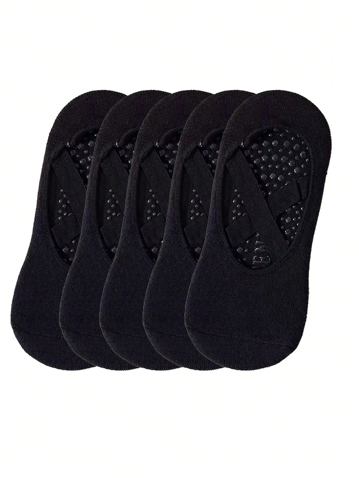 Un set de calcetines deportivos negros de silicona antideslizantes para yoga y pilates