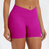A model wearing bright magenta seamless high-waist yoga leggings.