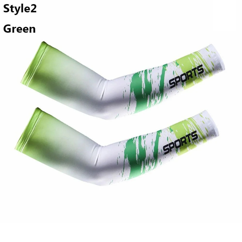 A pair of green sports arm sleeves shown against a white background.