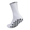 White performance sports gripping socks shown in a close-up view