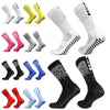 A collection of honeycomb grip football socks in various colors and patterns.