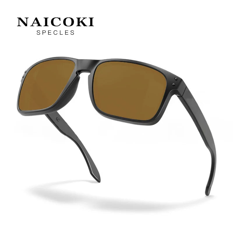 A pair of black sunglasses with brown lenses shown against a white background.