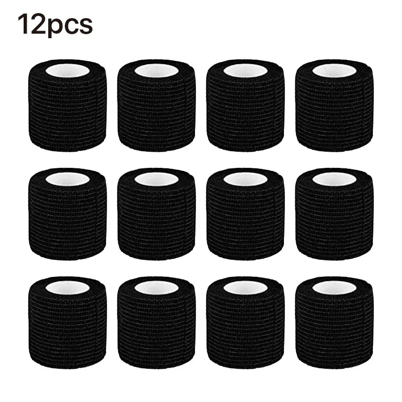 A pack of twelve black disposable anti-slip tattoo bandages rolled into individual tubes.