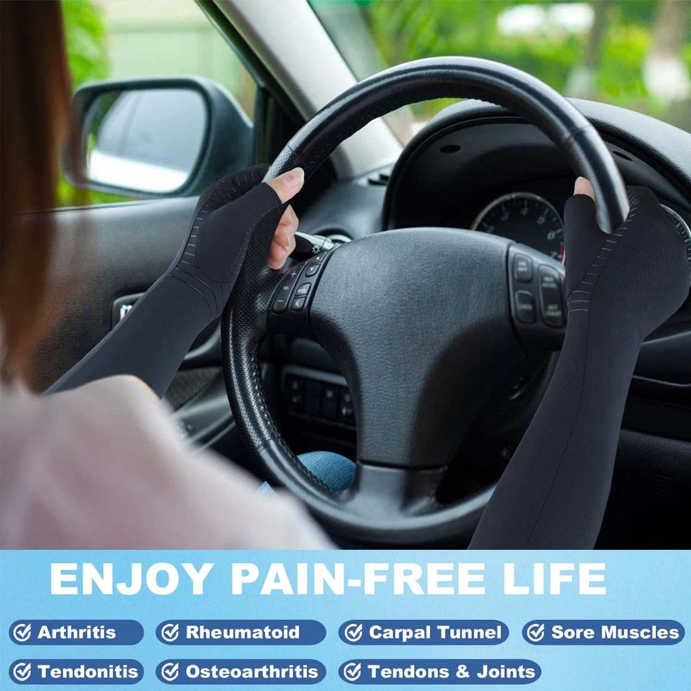 Black compression gloves being worn on a steering wheel, promoting pain-free life for arthritis and muscle soreness.