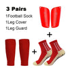 A set of three pairs of red sports soccer socks, leg covers, and leg guards for football training.