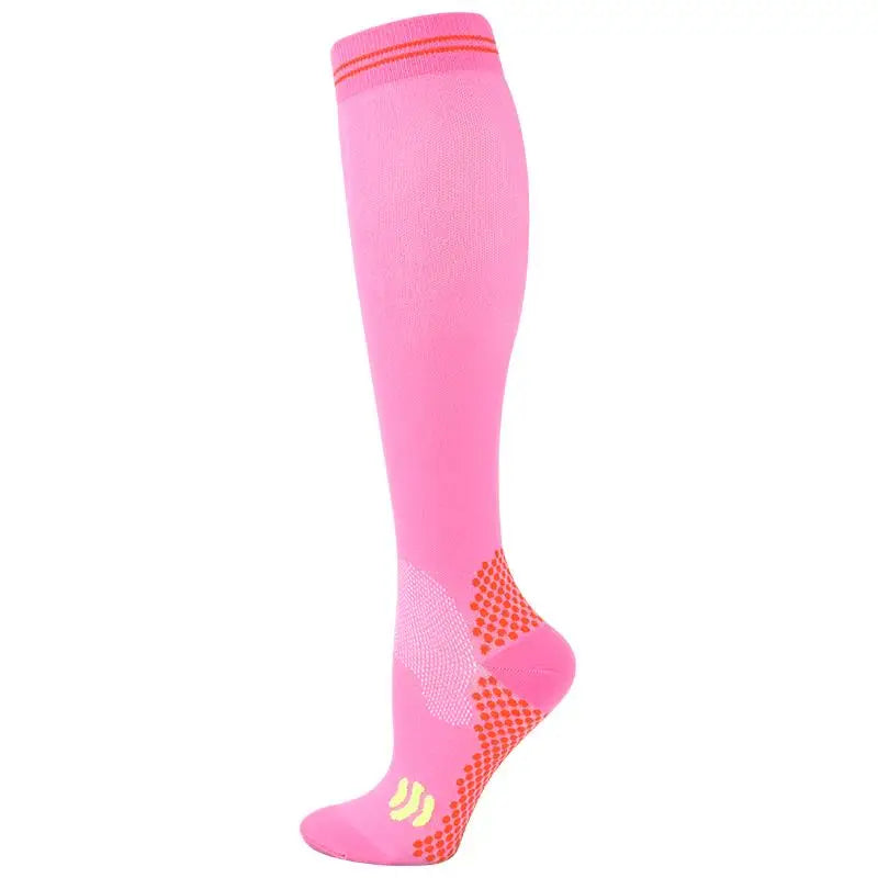 A bright pink medical grade compression sock shown vertically.