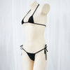 Black halter neck two-piece triangle bikini set displayed on a mannequin against a white background