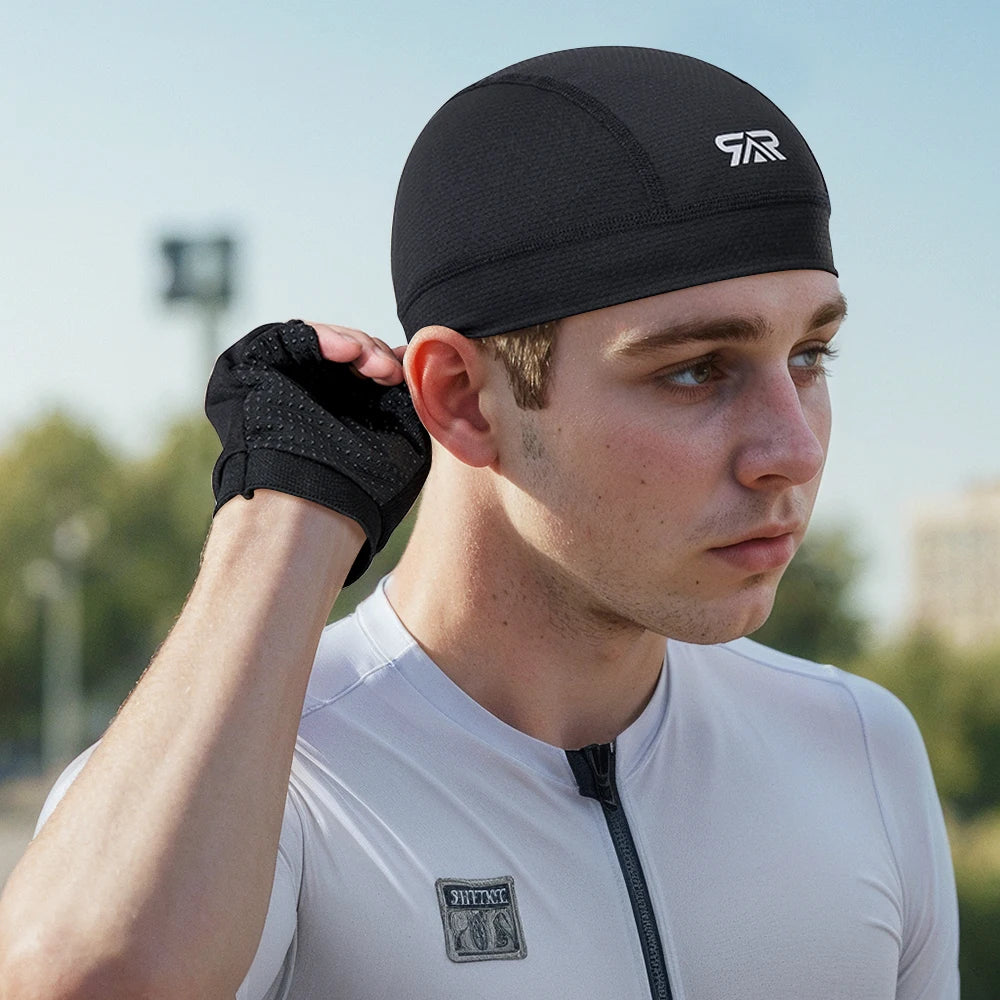 A man wearing a black cycling cap is shown in a profile view outdoors.