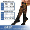 A pair of black graduated compression socks with gold patterned accents shown on a person's leg.