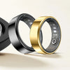 A close-up of a gold and black smart health ring fitness tracker displayed against a light background.