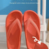 Pair of orange anti-skid bump massage air cushion flip flops shown on a white surface.