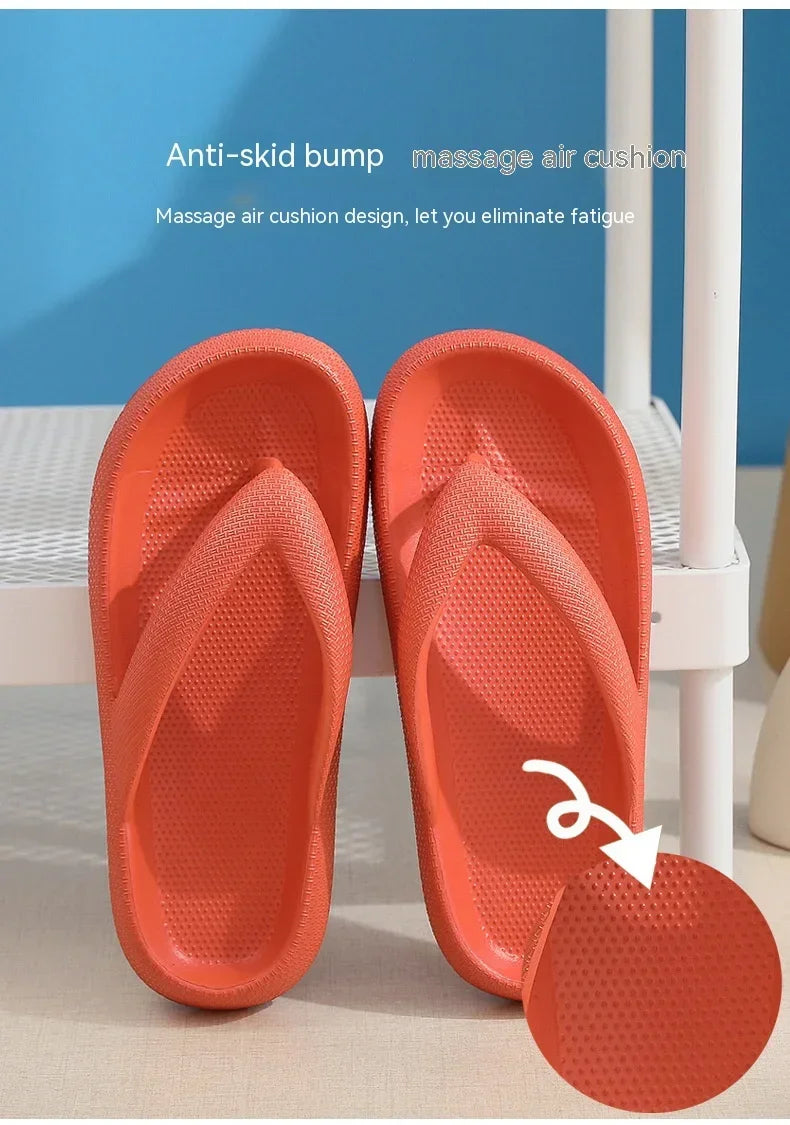 Pair of orange anti-skid bump massage air cushion flip flops shown on a white surface.