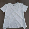 White women's breathable summer yoga and fitness t-shirt laid flat.