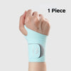 A light blue wrist compression brace is shown on a hand, with a gray insert visible.