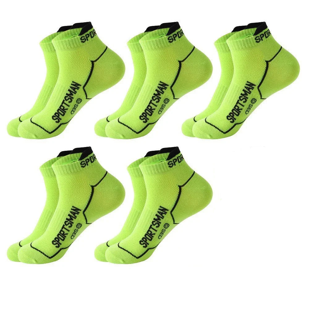 A pack of five bright lime green athletic socks with black text and mesh fabric displayed on a white background.