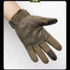 A close-up of olive green tactical full finger gloves worn on a hand.