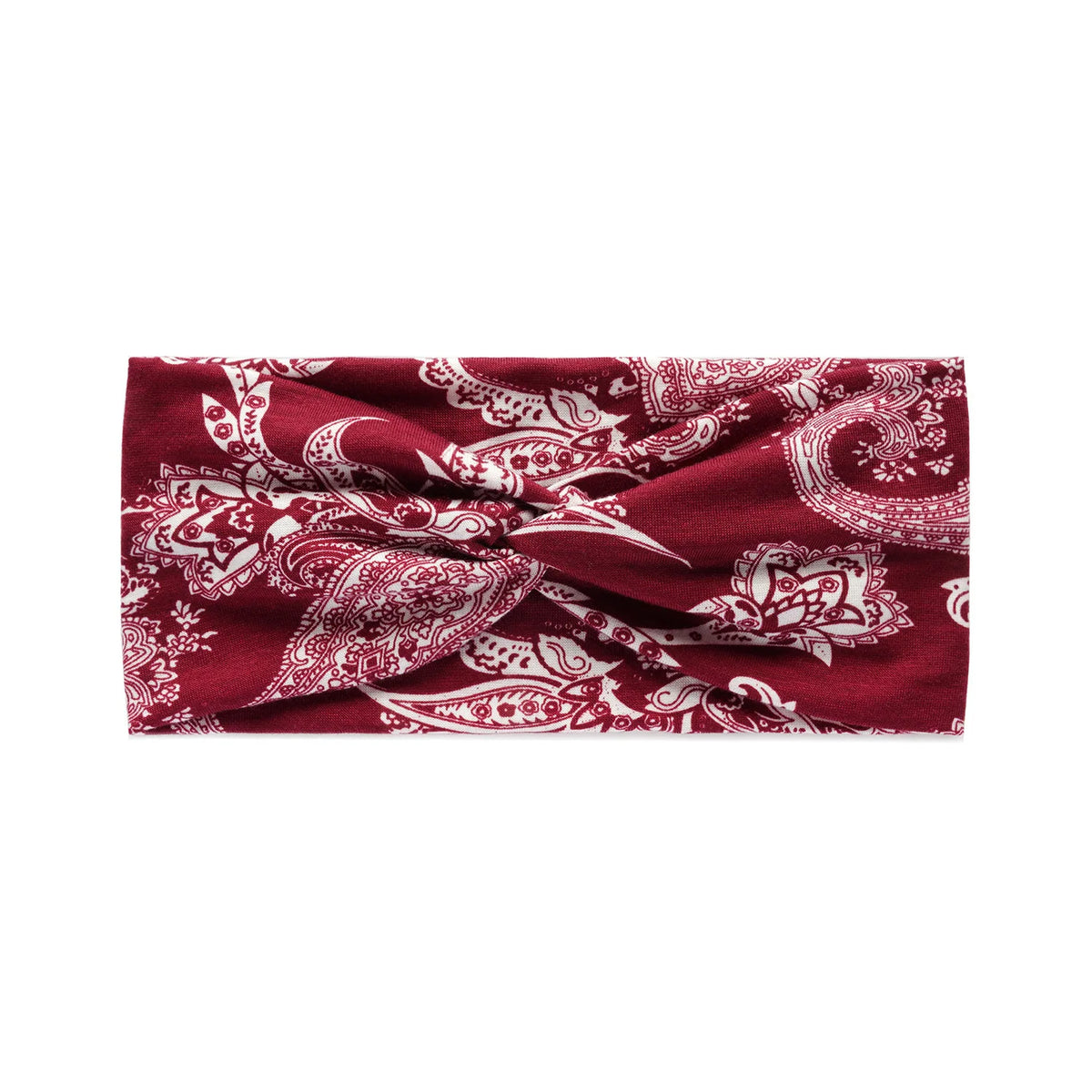 A close-up of a deep red fabric featuring an intricate white bohemian vintage print pattern.