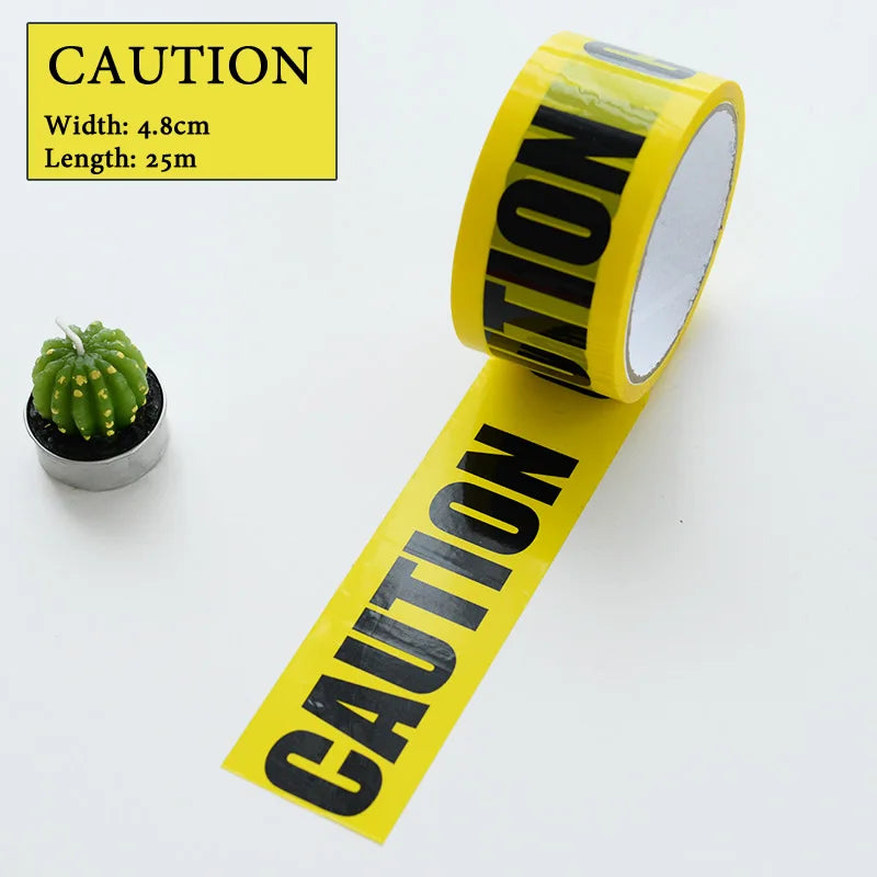 Yellow caution tape roll with black lettering and dimensions listed on a white background.