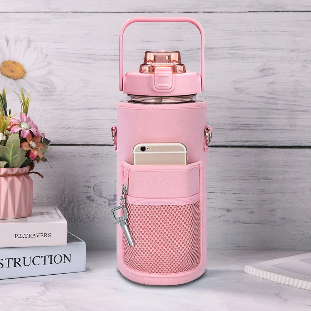 A pink protective water bottle sleeve features a clear bottle and a dedicated phone holder and key loop.