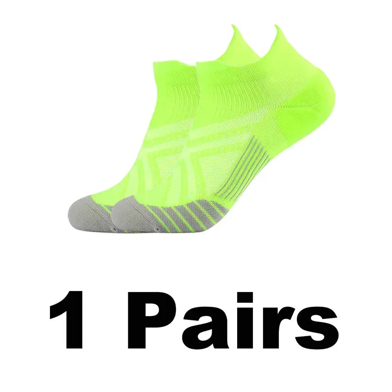 One pair of neon yellow performance compression sports socks shown from the side.