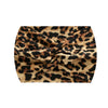 A close-up of a brown and black leopard print fabric tied into a wide, knotted headband.
