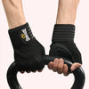 A person is holding a black anti-slip weightlifting hand protection glove with a yellow logo on the wrist.