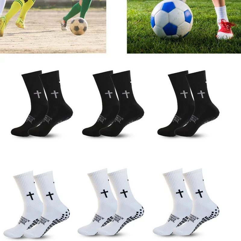 A collection of black and white performance athletic socks for sports and fitness.