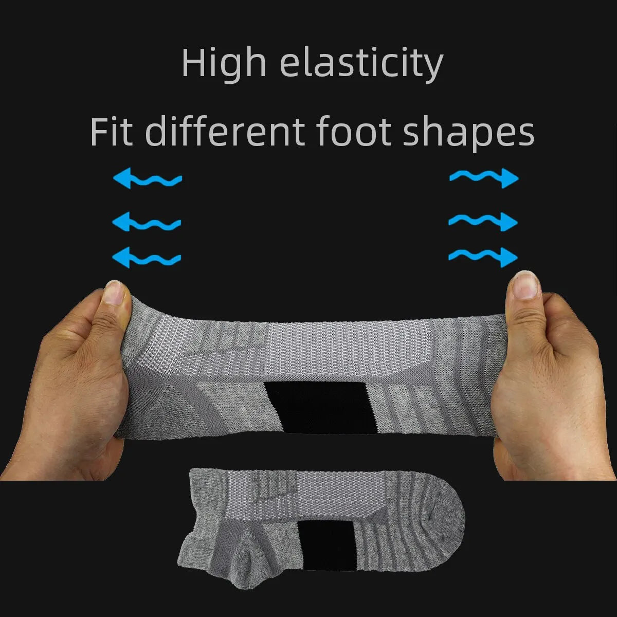 Gray performance running socks shown being stretched to demonstrate high elasticity and fit for different foot shapes