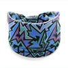 A close-up of a patterned bohemian stretch cotton headband featuring geometric designs in shades of purple, blue, and black.