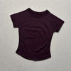 A dark purple seamless high-waist yoga top for women shown against a light background.