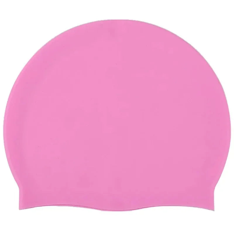 A solid pink waterproof silicone swim cap viewed from above.