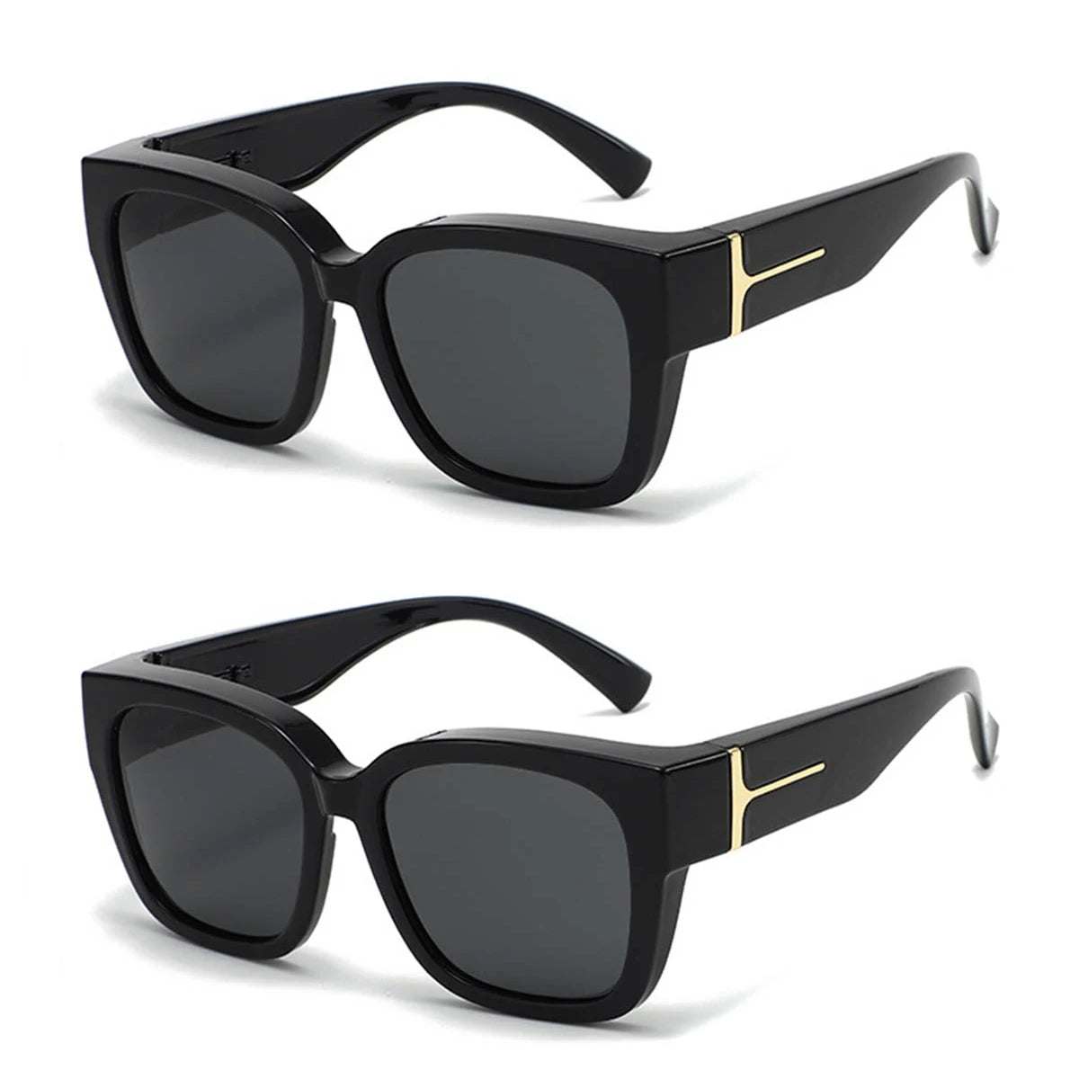 Black oversized sunglasses with gold accents shown in a studio shot.