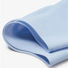Light blue waterproof silicone swim cap folded and displayed on a white background.