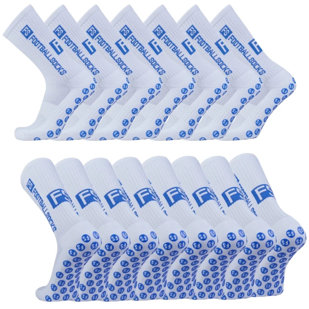 A set of white non-slip grip socks with blue text and logos, displayed in two rows.