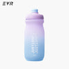 A light purple squeezable cycling water bottle with a light blue cap.