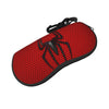 A red silicone pouch shaped like a spider web, used for storing eyeglasses.