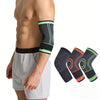 A person wearing a black elbow protector sleeve with neon green trim on their arm.