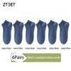 A set of six navy blue men's combed cotton socks displayed individually.