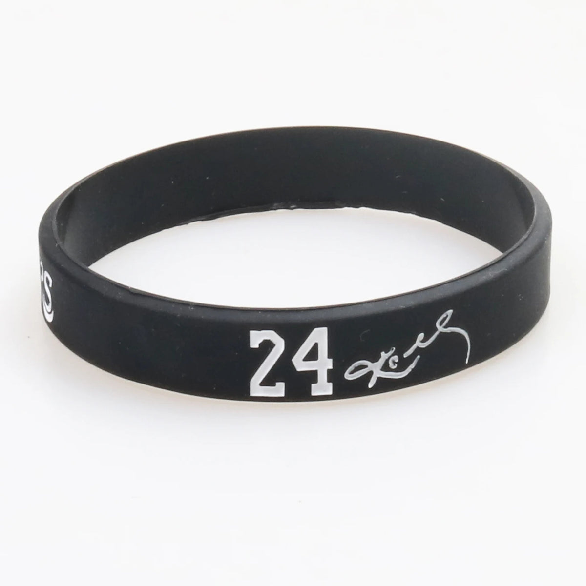 Black silicone wristband with the number 24 and a signature on the front