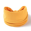 A mustard yellow boho wide headband hair wrap for women shown in a close-up view.
