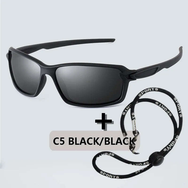 Black sports sunglasses with a black strap shown against a light gray background.