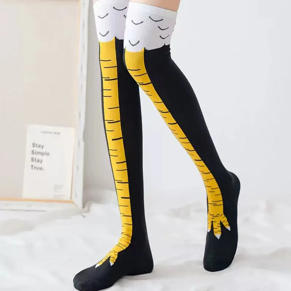 Black over-the-knee socks with yellow cartoon chicken stripes and white cuff
