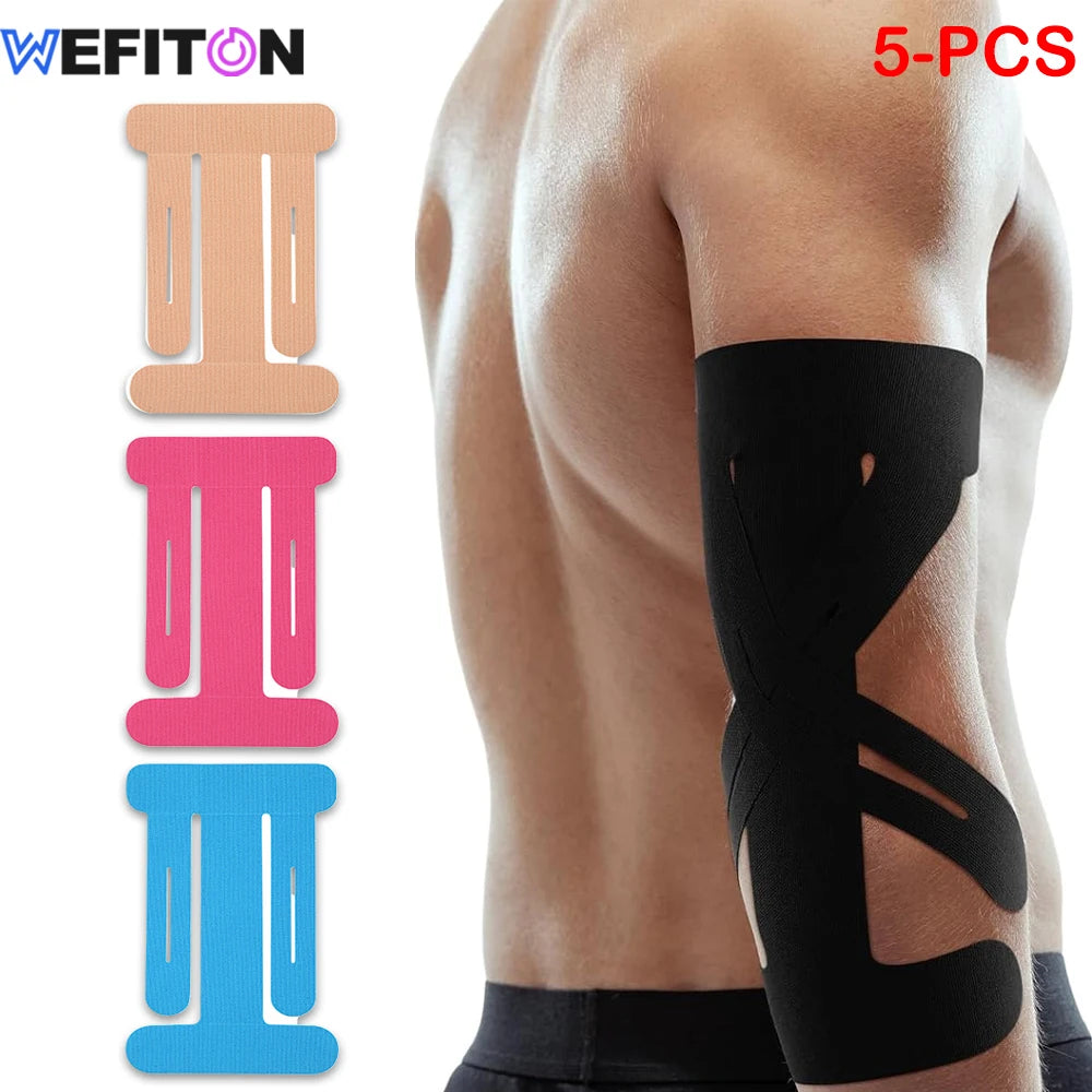 Five pieces of black kinesiology support tape applied to the back and shoulder area.