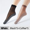 A pair of black and coffee colored ultra-thin breathable ankle socks shown on a foot.