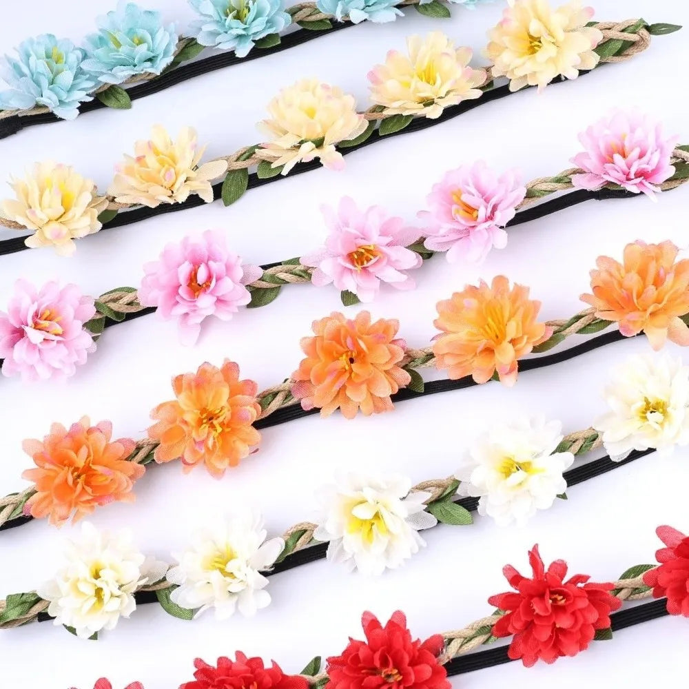 A collection of floral rose wreath crown headpieces in various shades of yellow, orange, pink, and white.